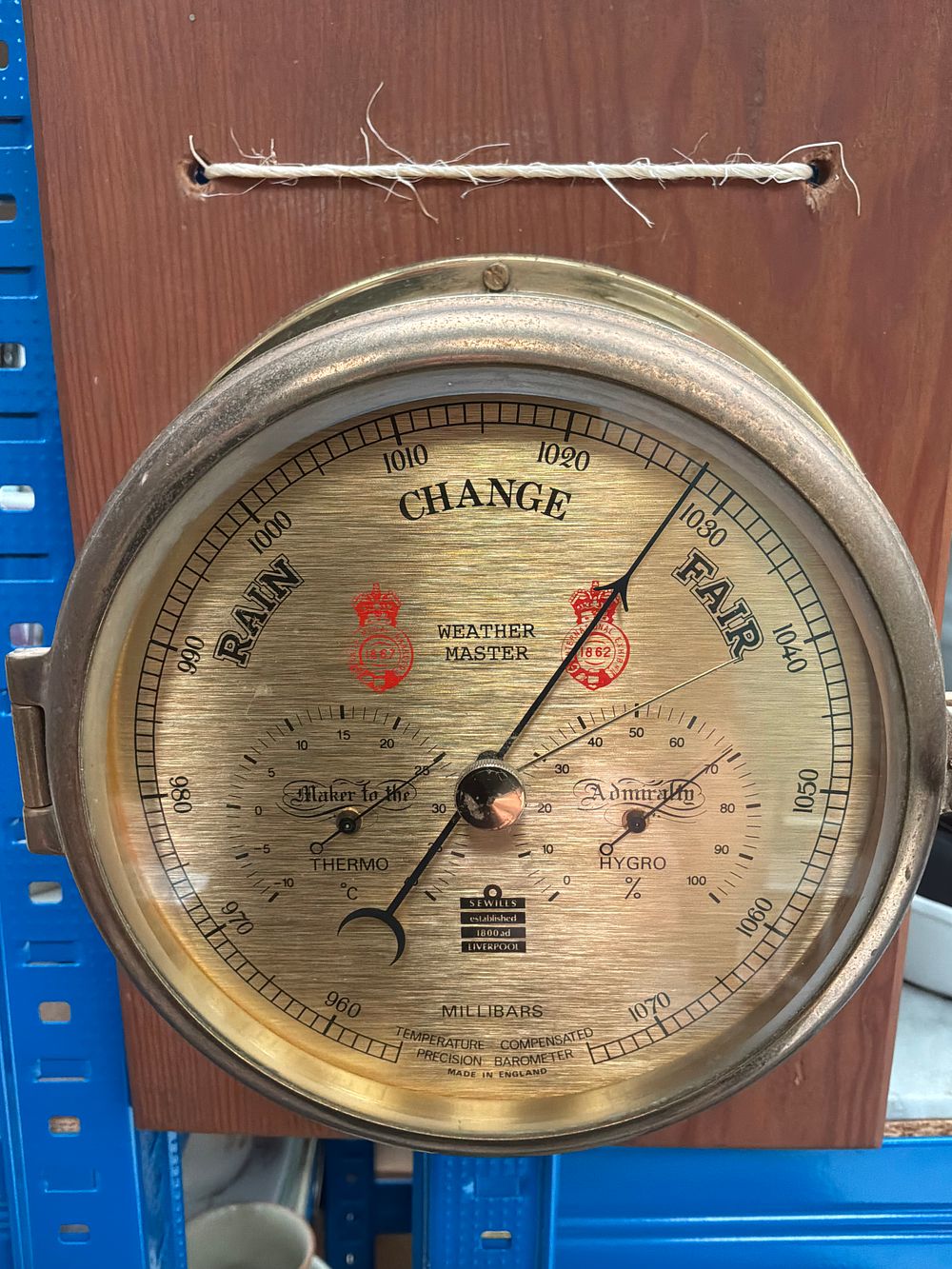 Lot 192: A Sewills of Liverpool Weather Master Brass Aneroid Barometer and Weather Station