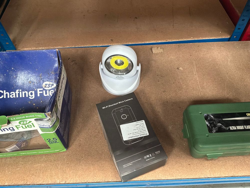 Lot 193: A Collection of Domestic Security and Catering Items to include a Wi-Fi Doorbell Camera, a GOREAD Tactical Flashlight, and Chafing Fuel
