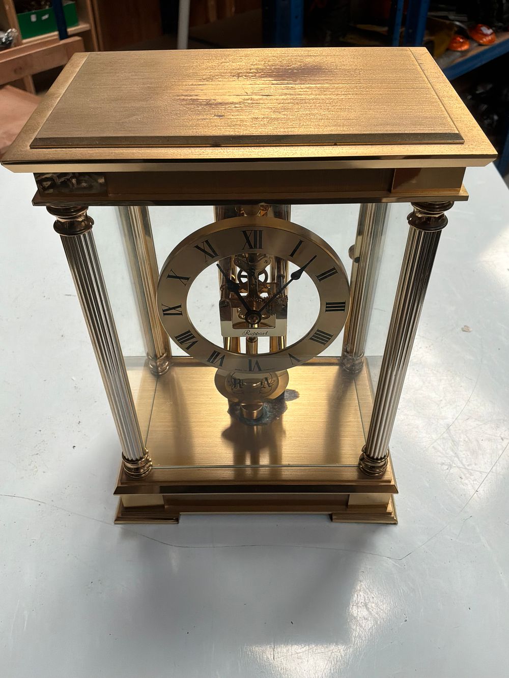 Lot 206: A Rapport Gilt Metal and Glass Quartz Mantel Skeleton Clock