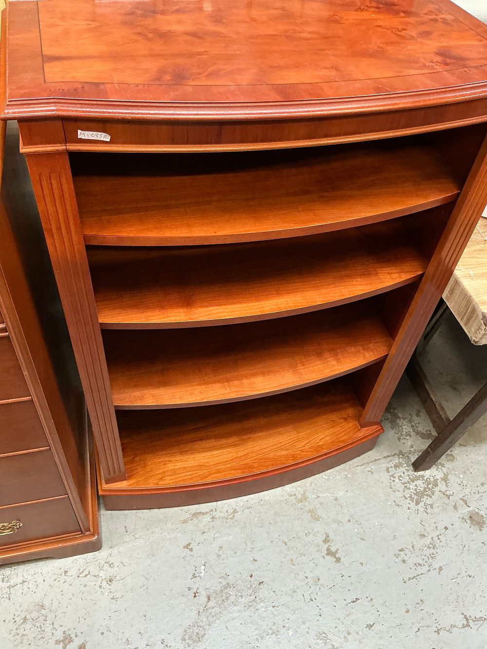 Lot 232: A Furnitureland Ltd High Yew Wood Veneered Bow-fronted Open Bookcase