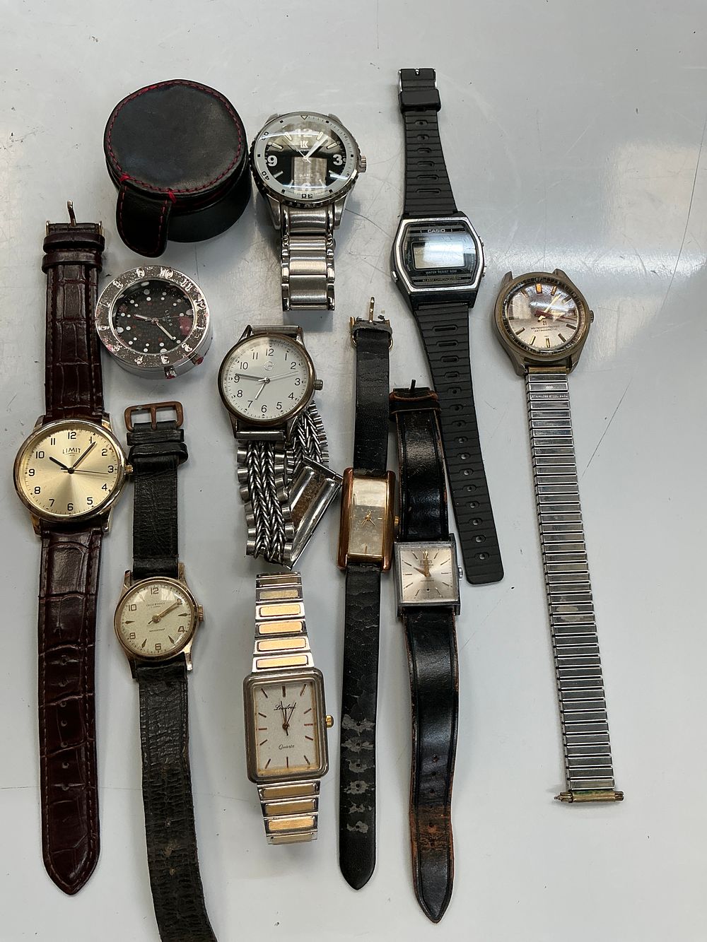 Lot 242: An Assortment of Vintage and Modern Wristwatches to include Ingersoll, Casio, and Calvin Klein