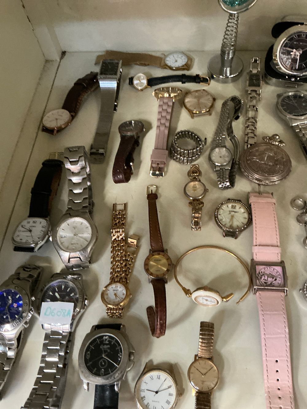 Lot 295: A Collection of Approximately 25 Men's and Women's Wristwatches, a Pocket Watch, and a Travel Clock