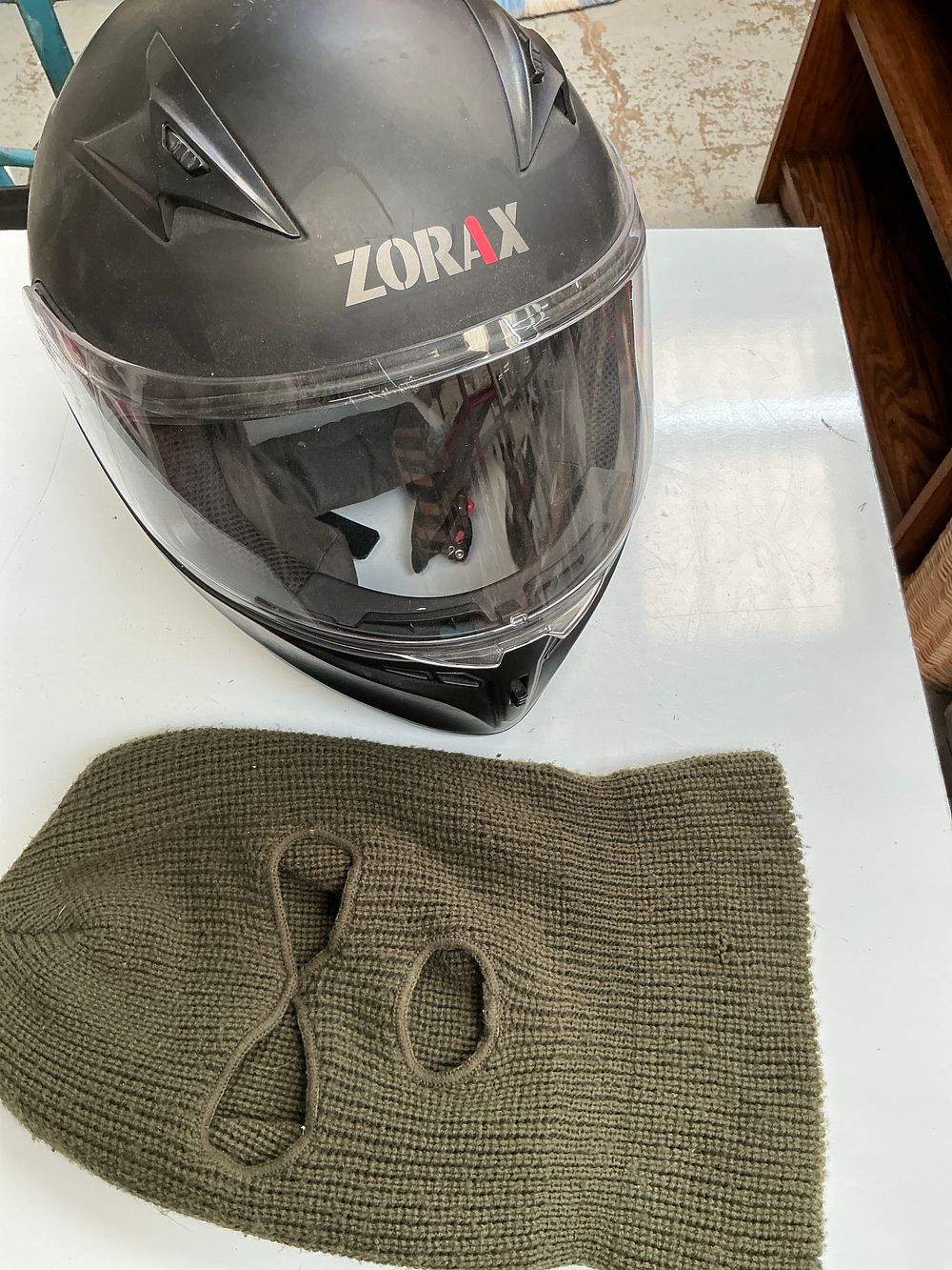Lot 297: Two Motorcycle Gear Items Including a Zorax Full-Face Helmet and Knitted Balaclava