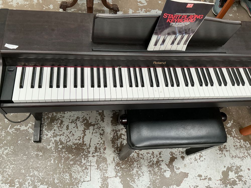 Lot 306: Roland 88-Key Console Digital Piano with Integrated Stand and Matching Bench