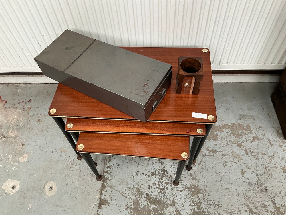Lot 311: A Group Lot Comprising a Nest of Three Mid-Century Modern Tables, a Metal Deed Box, and a Carved Wooden Vessel