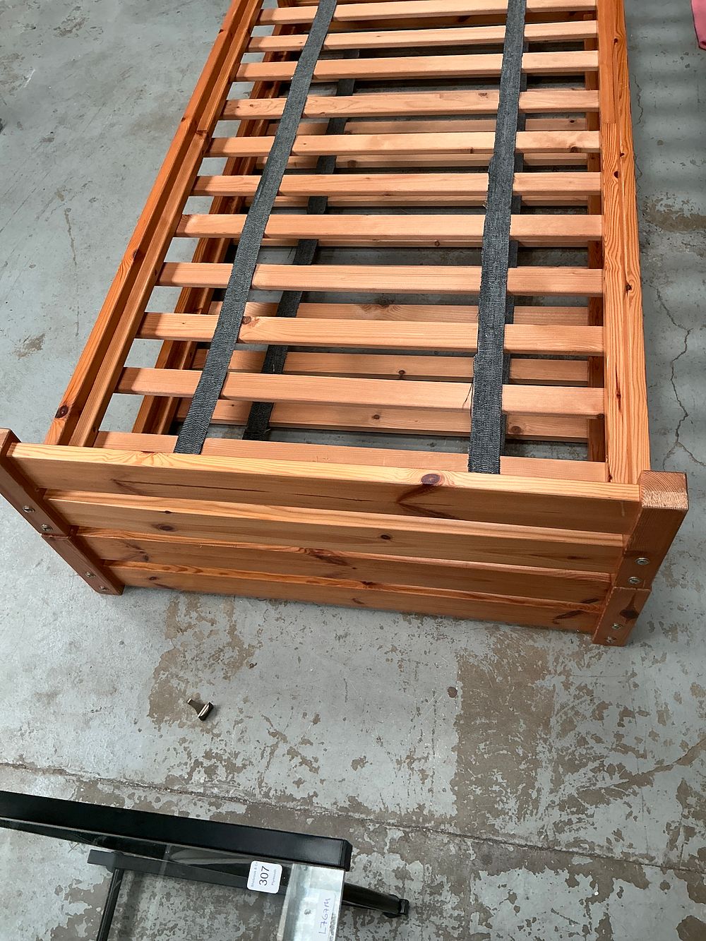 Lot 316: A Contemporary Slatted Pine Single/Double Up Bed Frame.