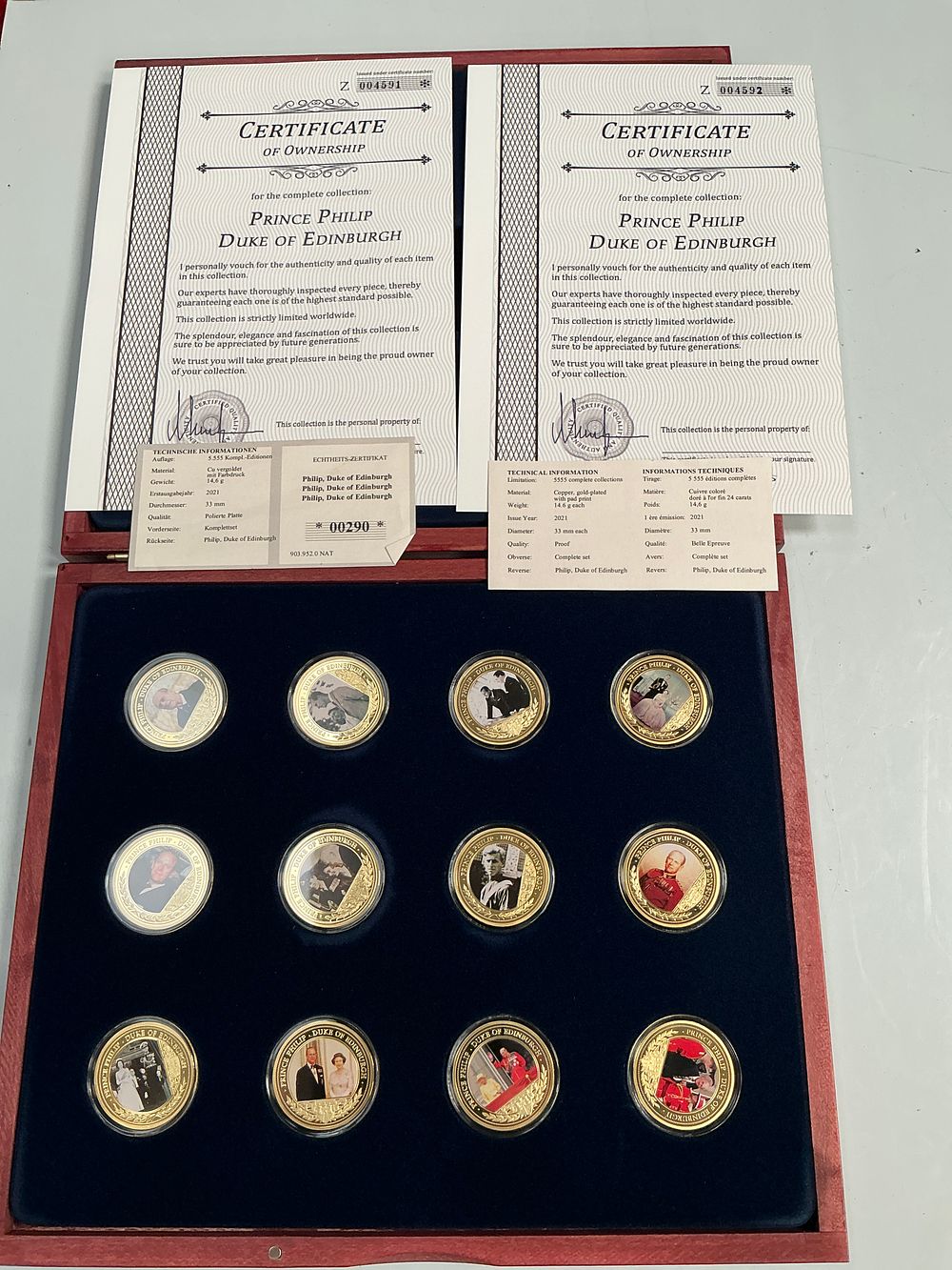 Lot 337: A Set of Twelve Prince Philip Duke of Edinburgh Commemorative Gold-Plated Copper Medals with Presentation Case