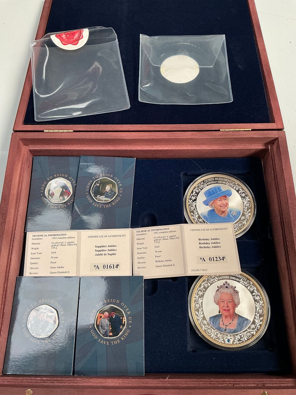Lot 340: A Collection of British Royal Commemorative Medals and Pieces in a Wood Presentation Case