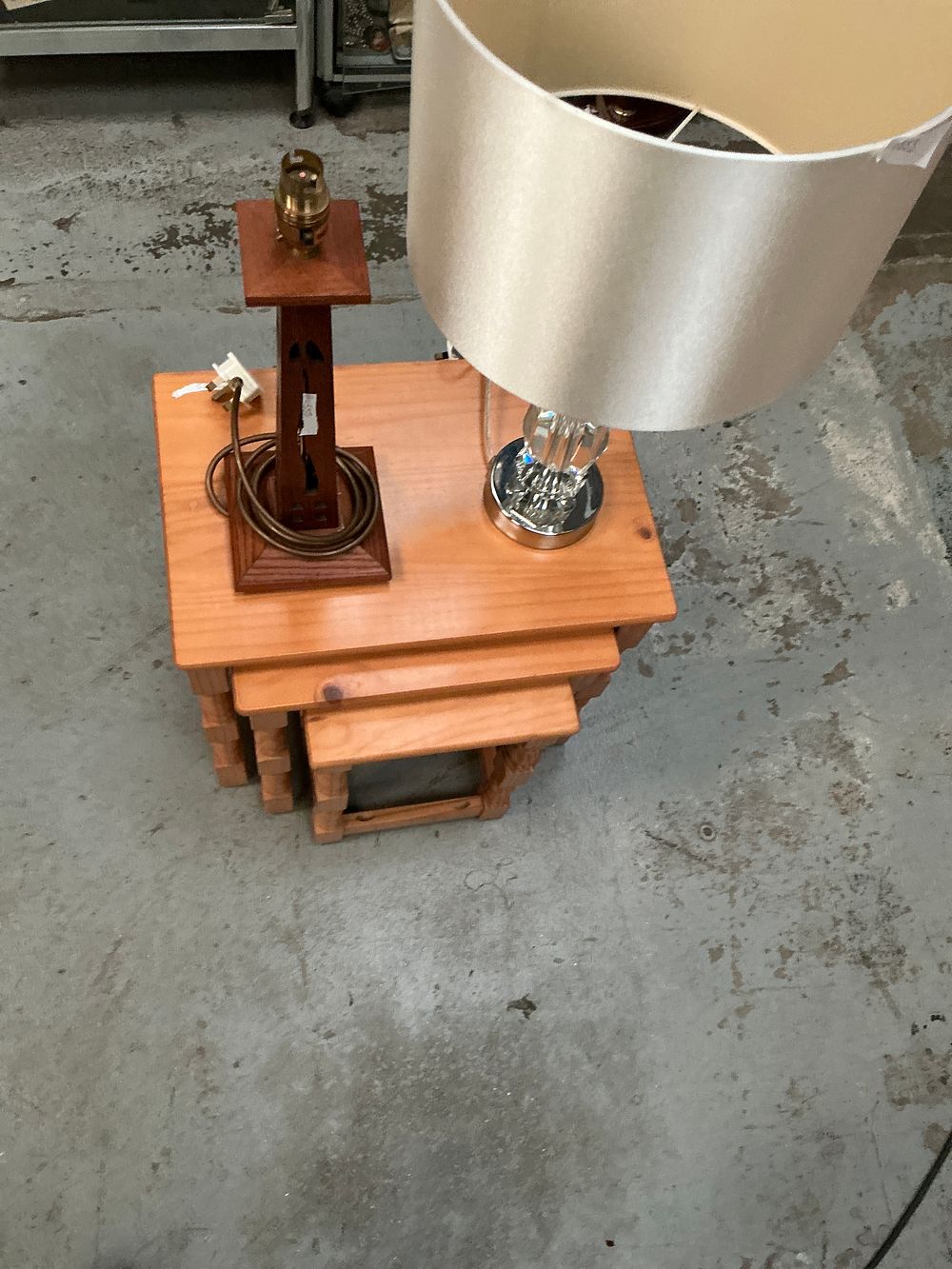 Lot 354: A Nest of Three Pine Side Tables and Two Decorative Table Lamps