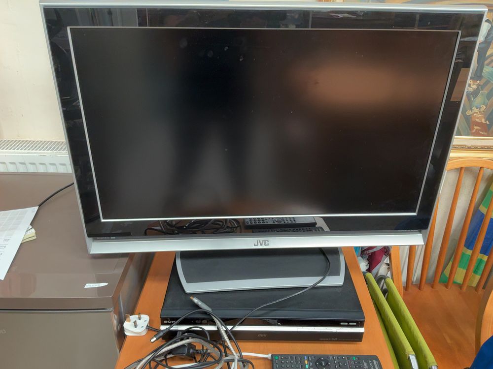 Lot 365: A JVC 32-inch LCD Television and a Sony DVD and Hard Disk Drive Recorder with Accessories