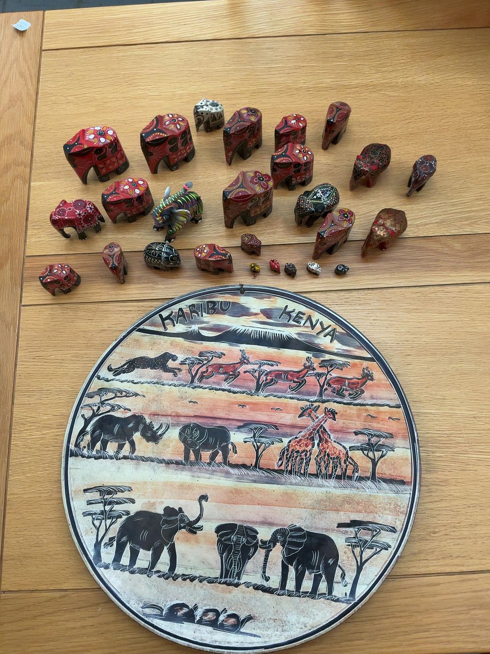 Lot 87: A Collection of 27 Hand-Painted Animal Figurines and a Kenya Soapstone Wall Plaque