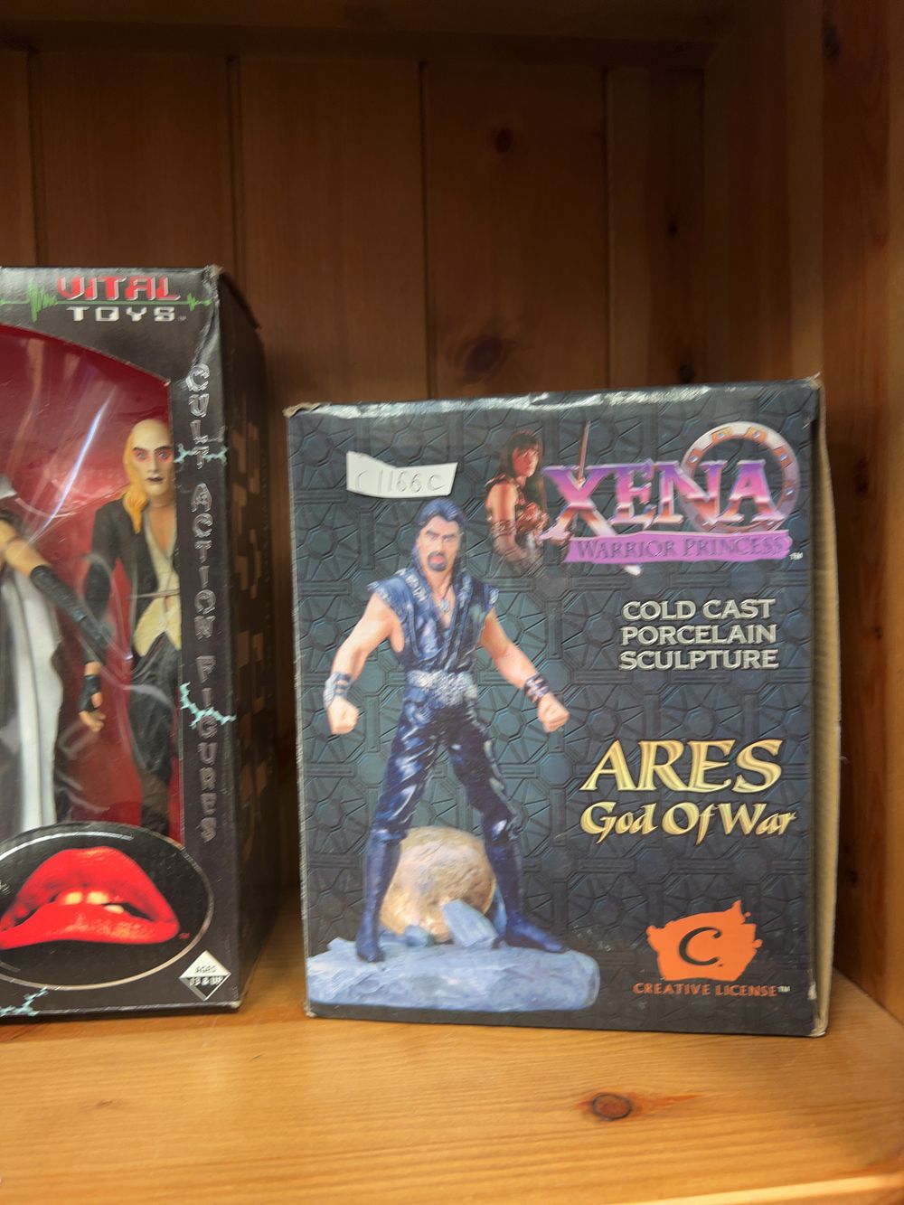 Lot 166: A Collection of Entertainment Memorabilia and Die-cast Vehicles including The Rocky Horror Picture Show Action Figure Set and Xena Ares Sculpture