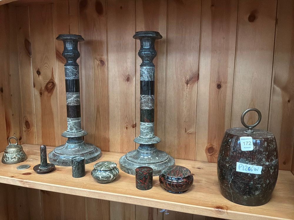 Lot 172: A Collection of Serpentine Stone Decorative Objects including a Pair of Candlesticks and a Brass Bell