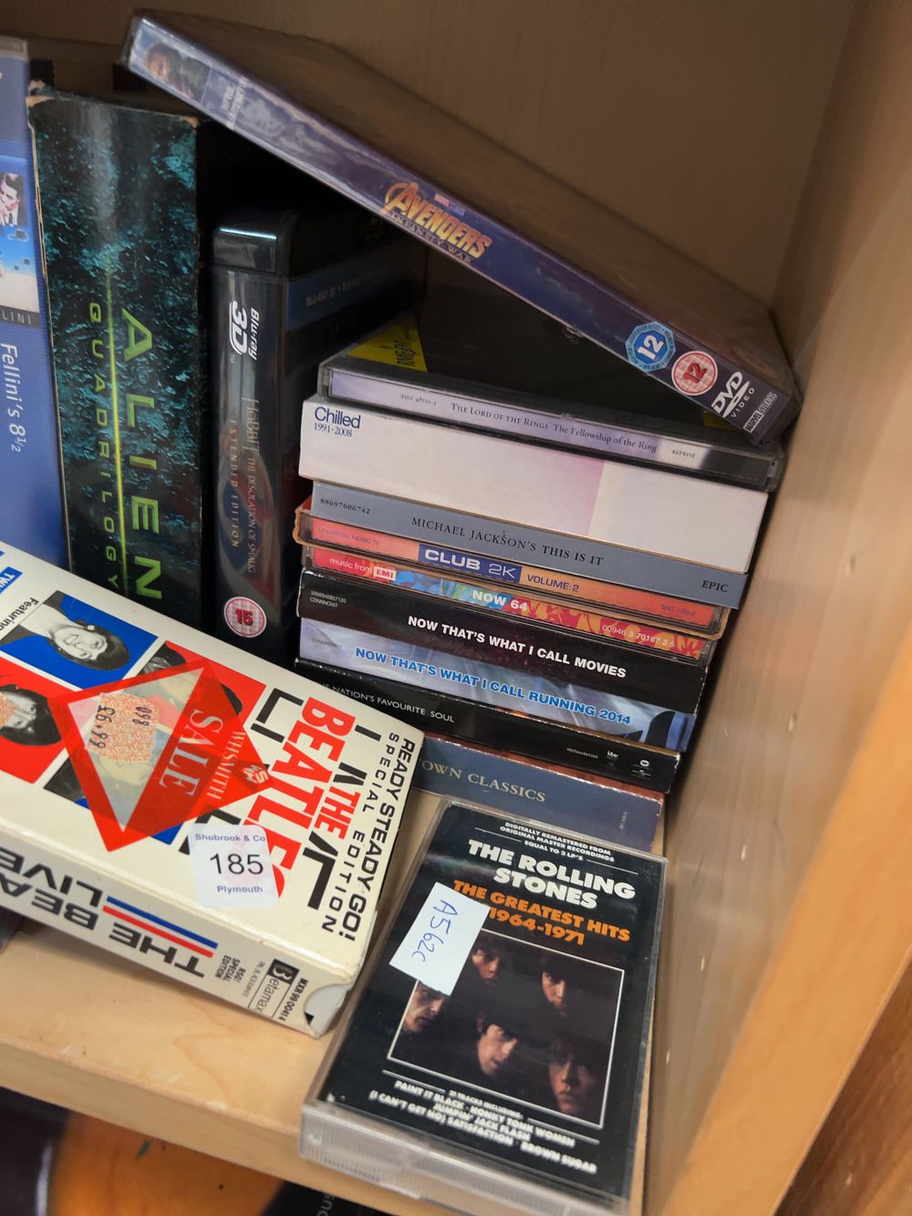 Lot 185: A Collection of Home Media including VHS Tapes, DVDs, Blu-ray Discs, and CDs