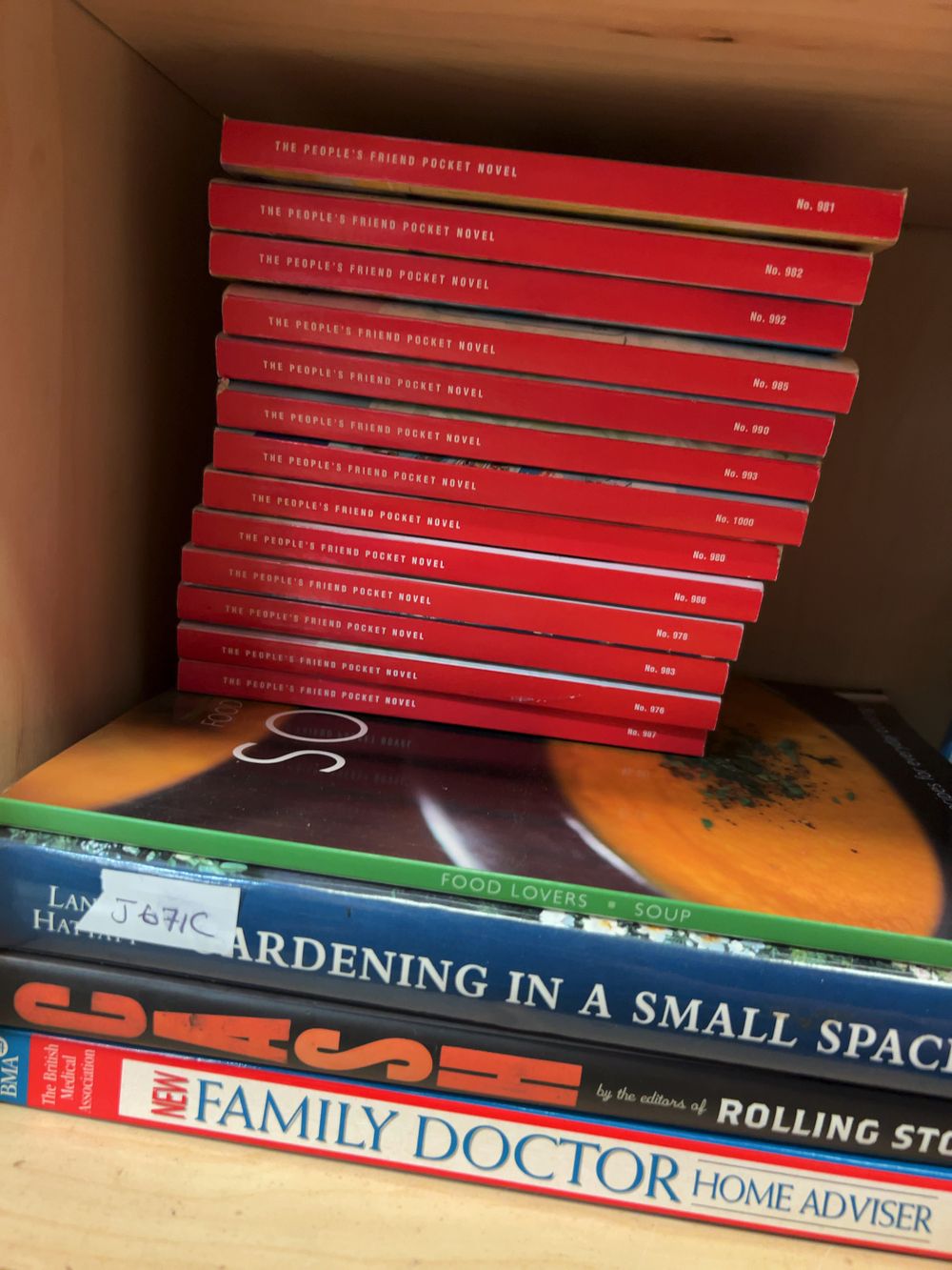 Lot 186: A Collection of Reference Books and Periodical Supplements including The People's Friend and Rolling Stone Examples