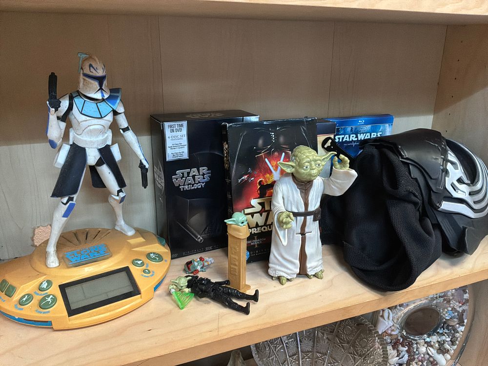 Lot 190: A Collection of Star Wars Memorabilia including A Voice Changer Mask and Media Box Sets