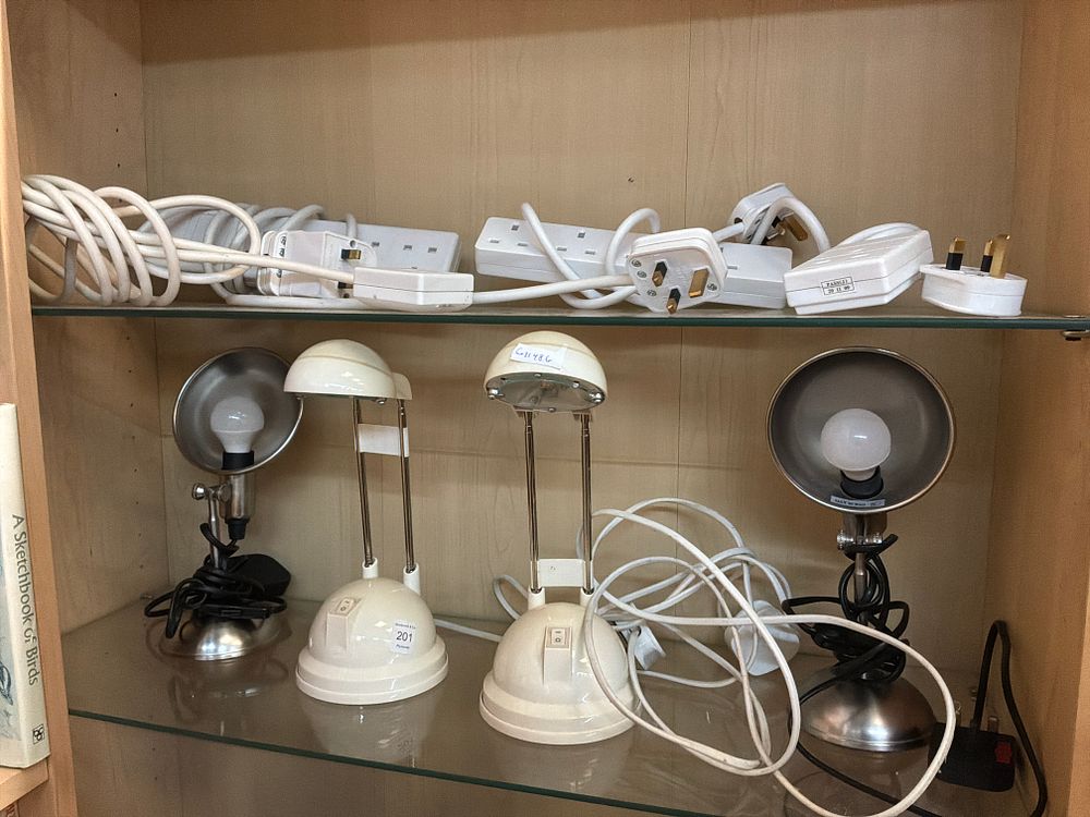 Lot 201: A Mixed Lot of four Desk Lamps and a Collection of White Plastic Extension Leads