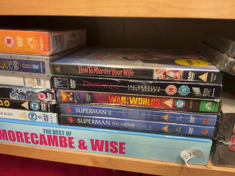 Lot 207: A Collection of Assorted DVD Movies and Box Sets Including James Bond and BBC Examples