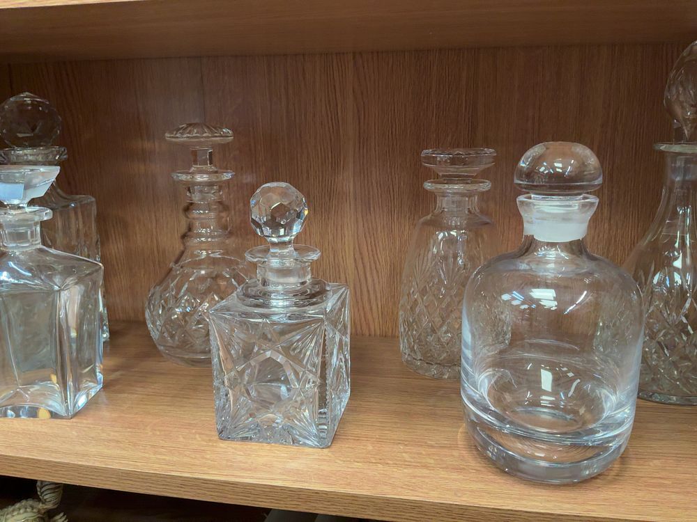 Lot 211: A Collection of Seven Assorted Lead Crystal and Glass Decanters