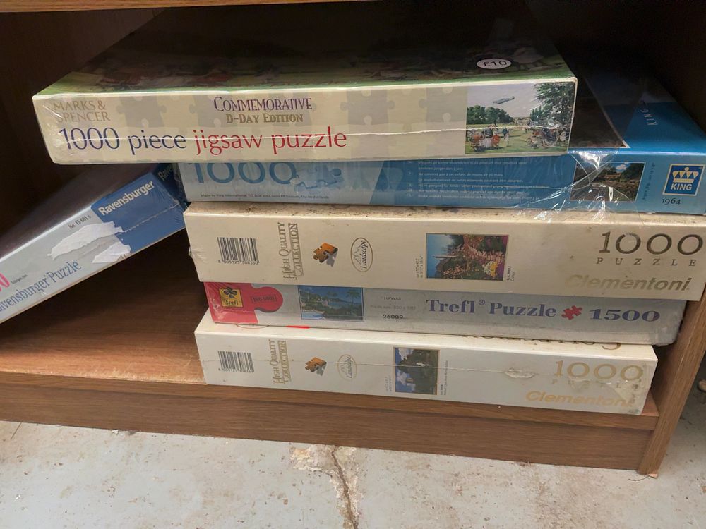 Lot 215: A Collection of Seven Cardboard Jigsaw Puzzles including Marks & Spencer, Ravensburger, Clementoni, Trefl, and King Examples