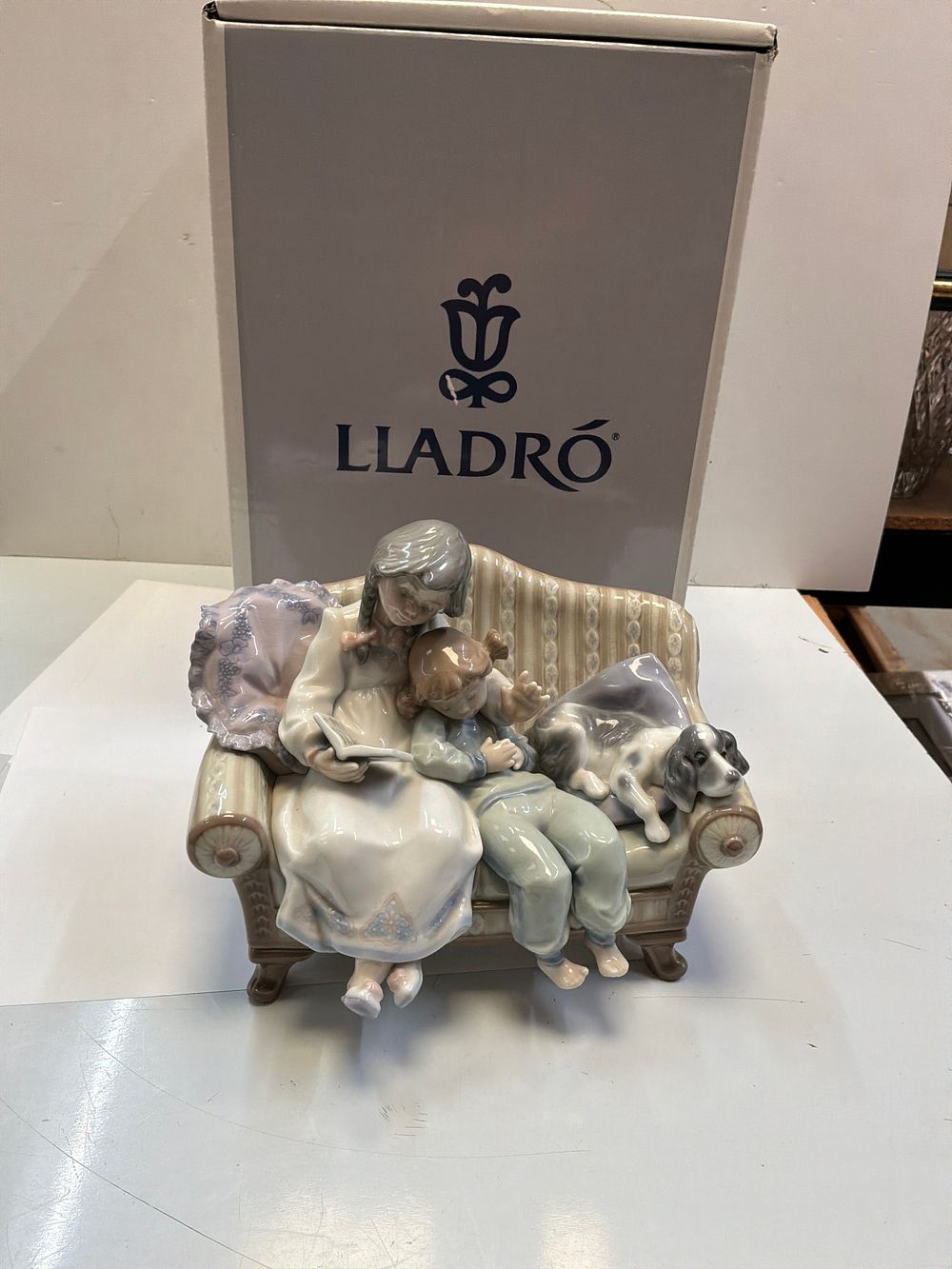 Lot 255: A Lladro Big Sister Glazed Porcelain Figurine with Original Presentation Box