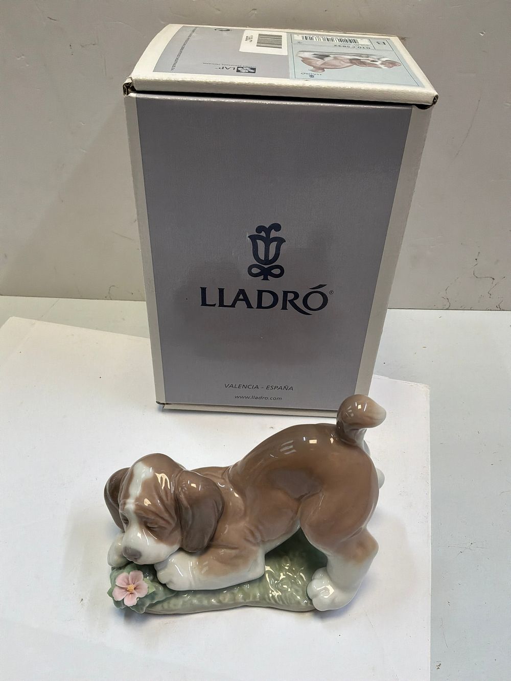 Lot 269: A Lladro Glazed Porcelain Puppy Figurine with Original Box