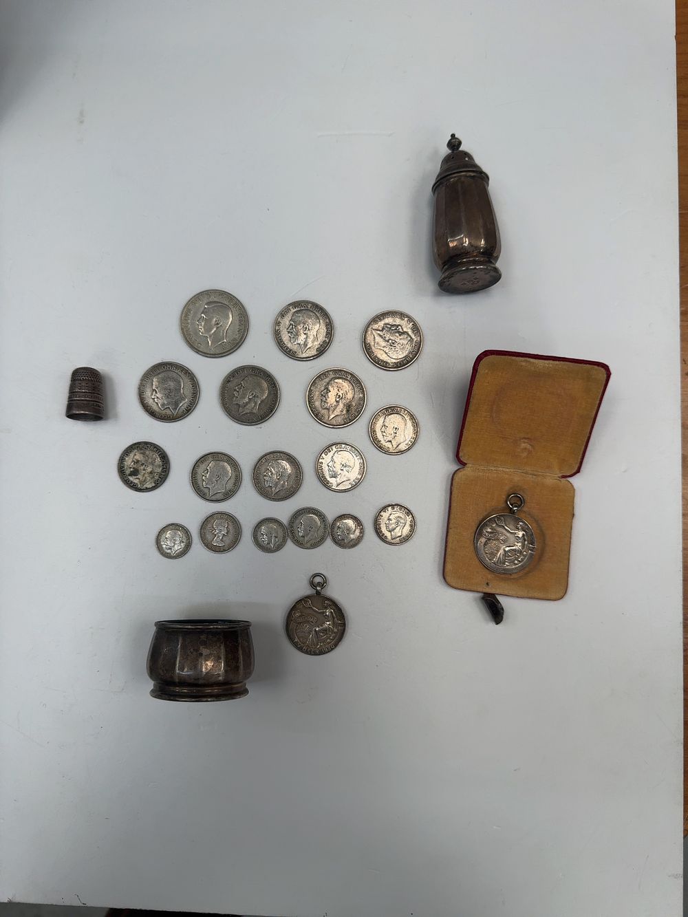 Lot 61: A Collection of British Silver Coins, Medals, and Sterling Silver Tableware Including a James Walker Thimble
