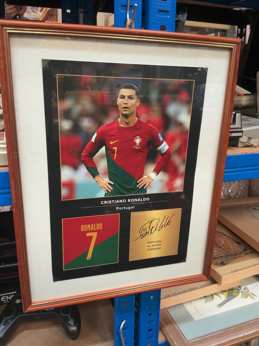 Lot 283: A Framed Cristiano Ronaldo Portugal National Team Memorabilia Display