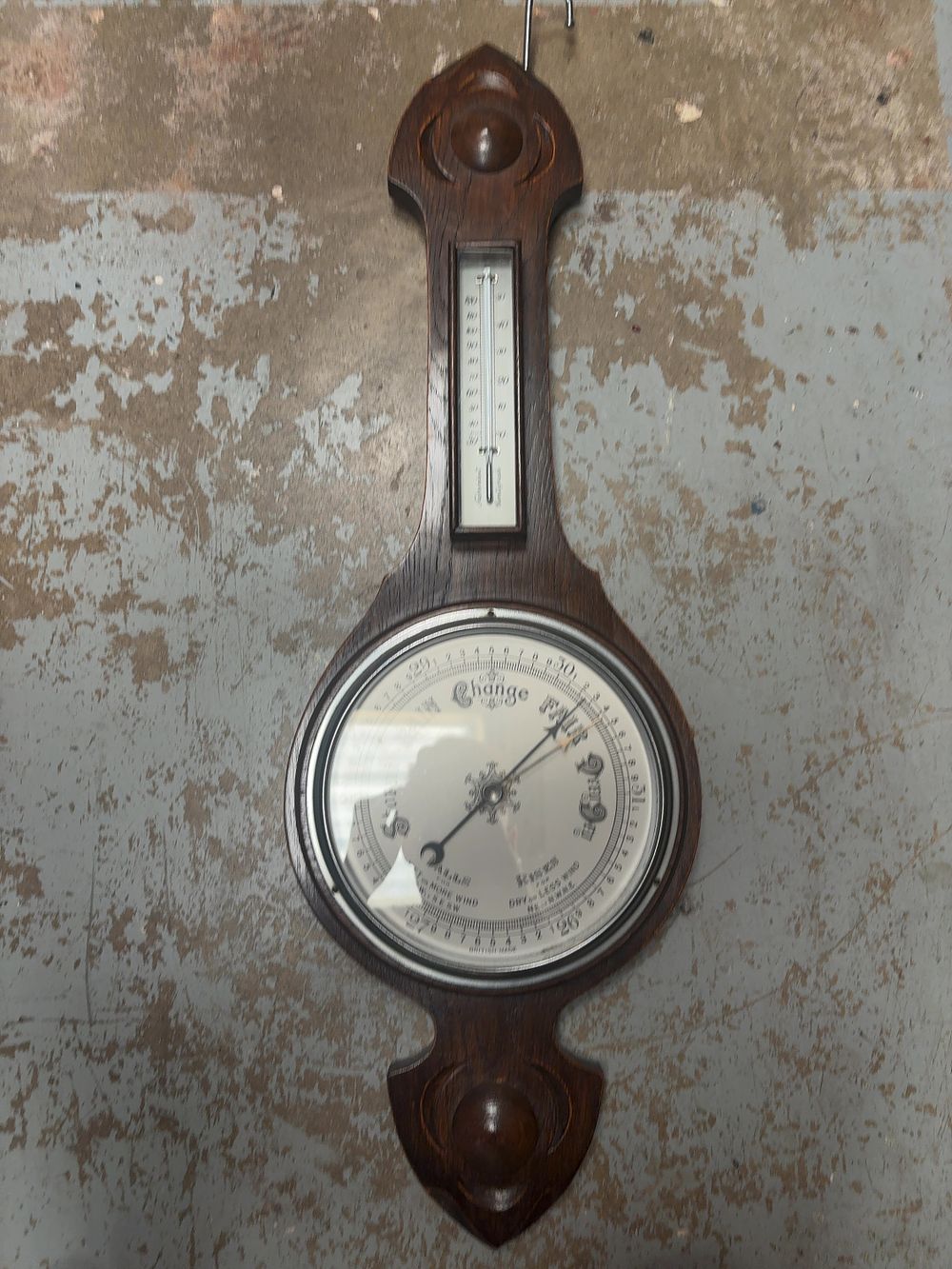 Lot 289: A British Made Phillips and Hyde Carved Wood Banjo Barometer and Thermometer