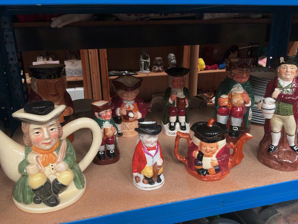Lot 300: A Collection of Ceramic Toby Jugs and Novelty Teapots Including Royal Doulton and Shorter & Son Examples