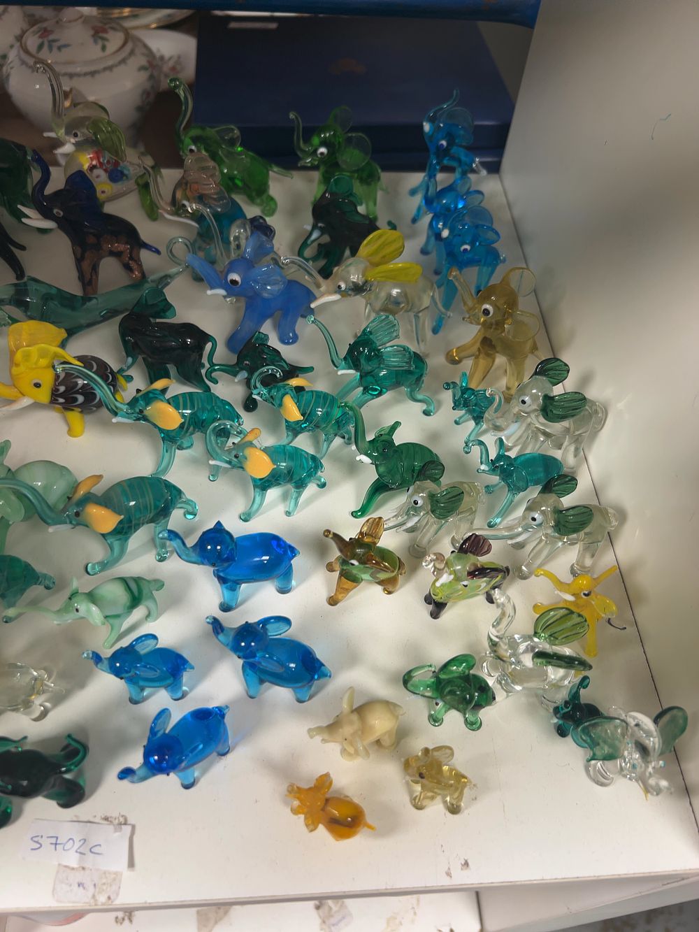 Lot 323: A Collection of Miniature Lampwork Glass Elephant Figurines