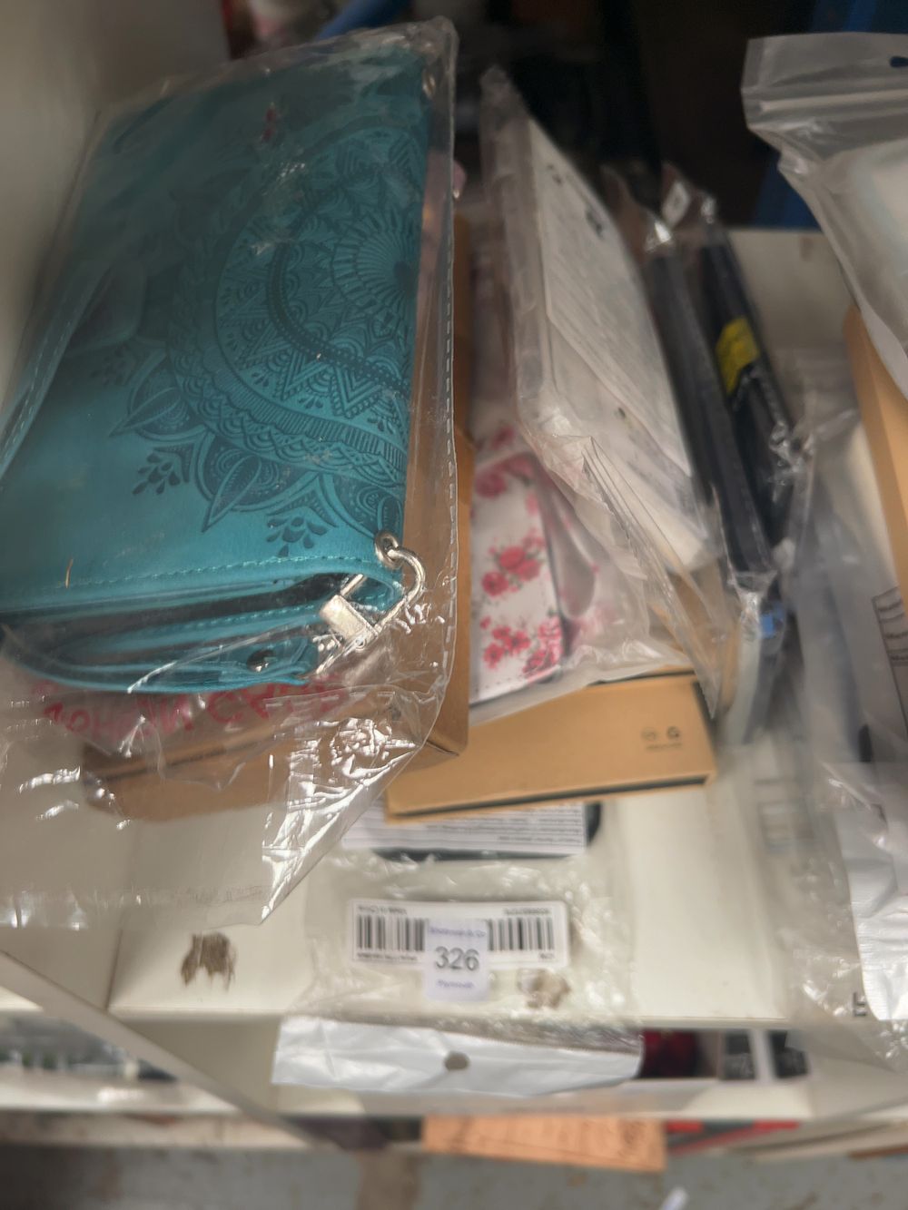 Lot 326: An Assortment of Synthetic Leather and Plastic Smartphone Accessories including iPhone 16 Pro style Cases