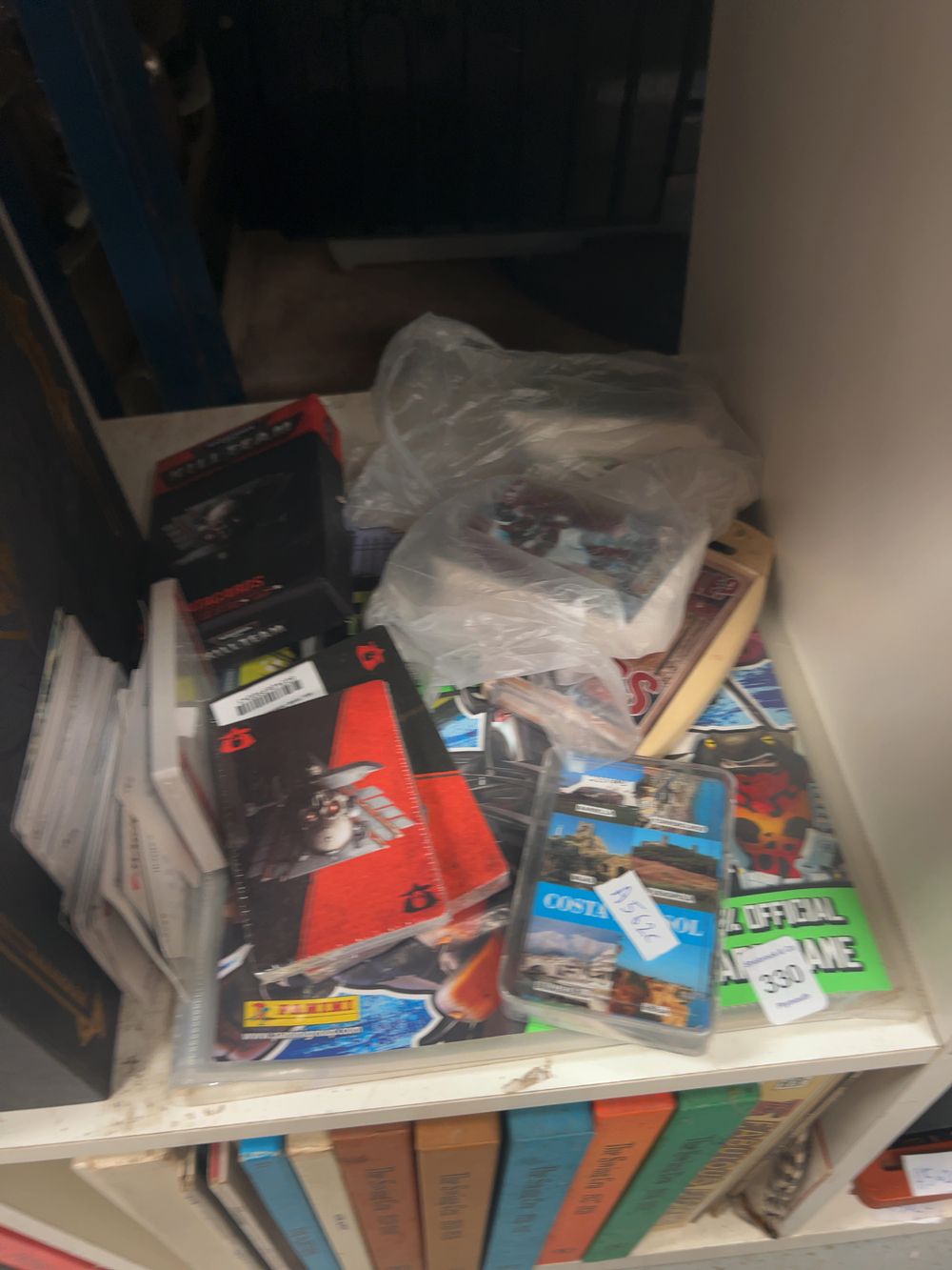Lot 330: A Collection of Tabletop Gaming Supplements and Trading Card Items including Panini and Kill Team Examples