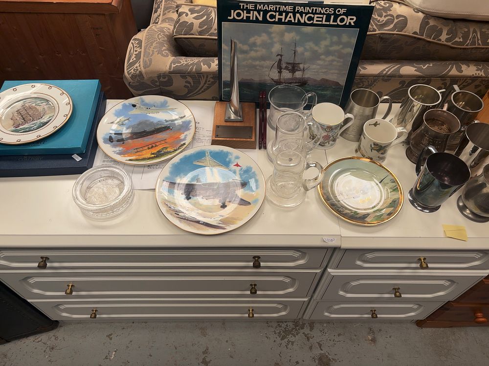 Lot 344: A Collection of Aviation and Maritime Themed Ceramics, Metalware, and Glassware including Coalport Examples
