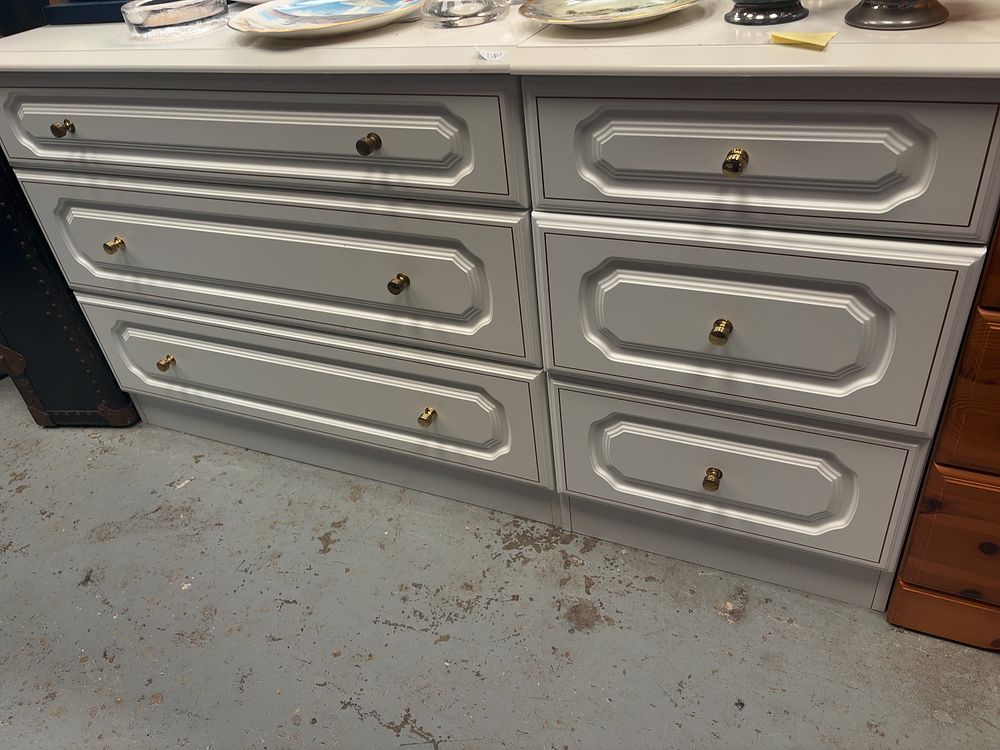 Lot 345: A Neoclassical Revival Style White Painted Chest of Three Drawers and Bedside Chest.