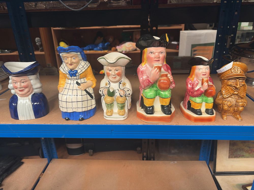 Lot 349: A Collection of Six Assorted British Ceramic Character and Toby Jugs Including a Cheddar Souvenir Pitcher