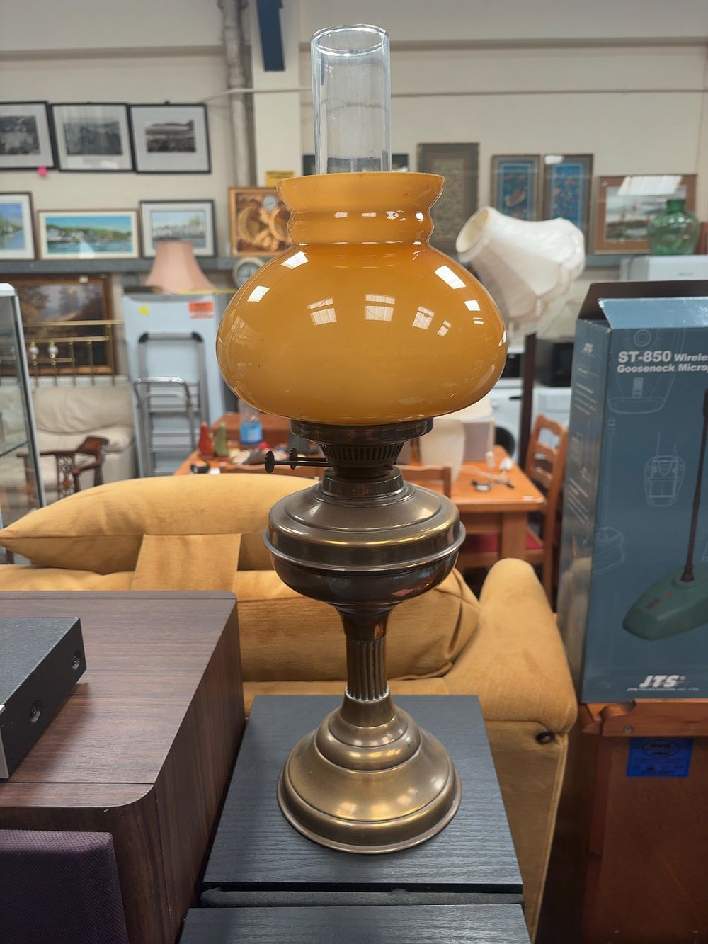 Lot 353: A Brass and Amber Cased Glass Paraffin Table Lamp