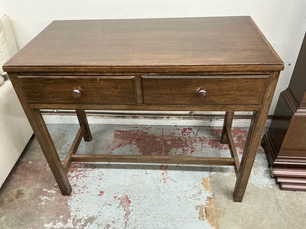 Lot 356: A Mid-20th Century Liss Bros Ltd Oak Two-Drawer Side Table