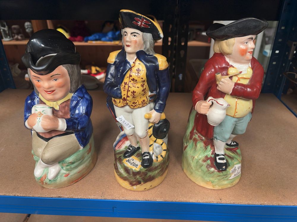 Lot 361: A Trio of Staffordshire Style Polychrome Glazed Ceramic Figurines Including Nelson