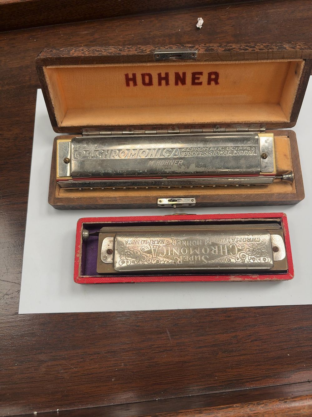 Lot 366: A Pair of Two Vintage M. Hohner Metal and Wood Chromatic Harmonicas with Presentation Cases