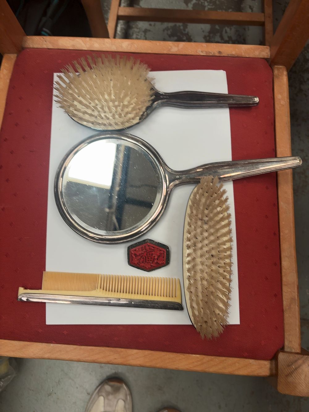 Lot 373: A Collection of Four Art Deco style Sterling Silver Vanity Accessories and a Brooch