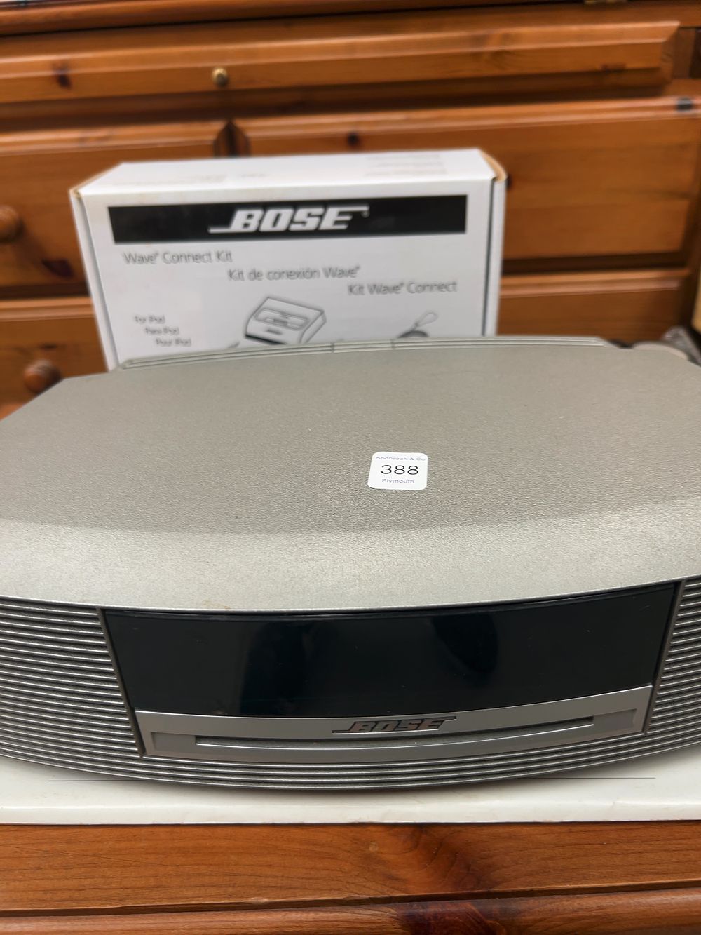 Lot 388: A Bose Wave Music System with Wave Connect Kit and Accessories in Original Packaging