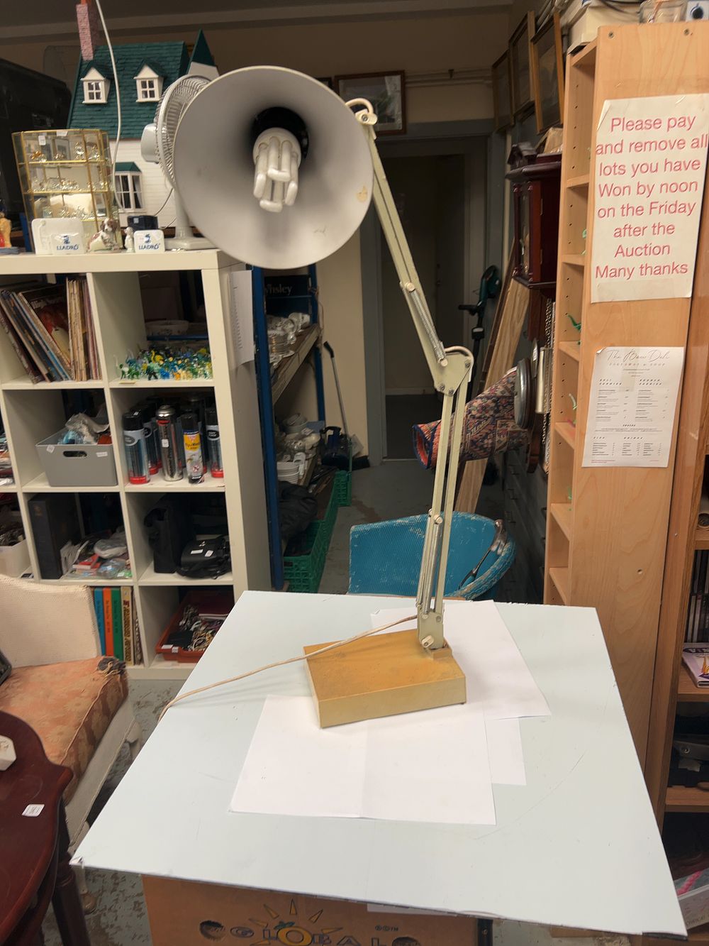 Lot 397_: An Anglepoise style Cream Painted and Brass Toned Metal Desk Lamp