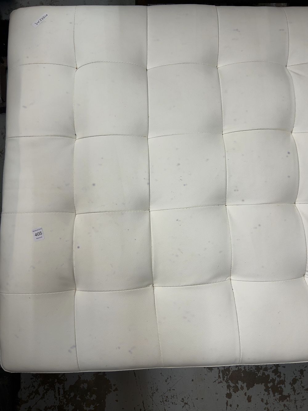 Lot 405: A Contemporary Square Grid Tufted White Upholstered Ottoman