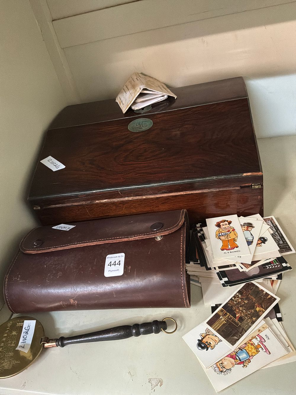 Lot 444: A Collection of Vintage and Historical Items including a Mahogany style Writing Slope and a WWII POW Postcard