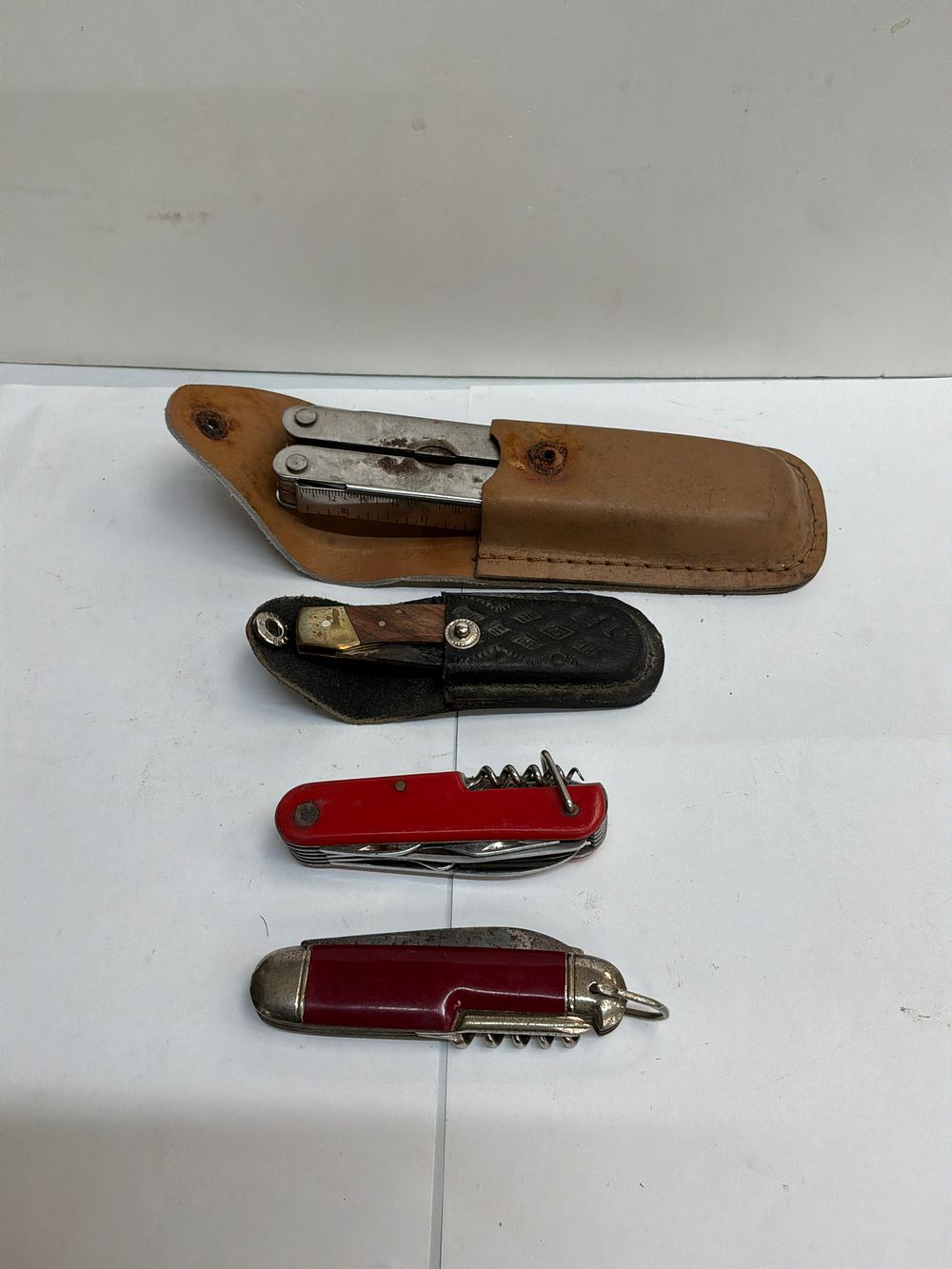 Lot 445: A Collection of Folding Multi-Tools and Pocket Knives including Kamasa-Tools Examples