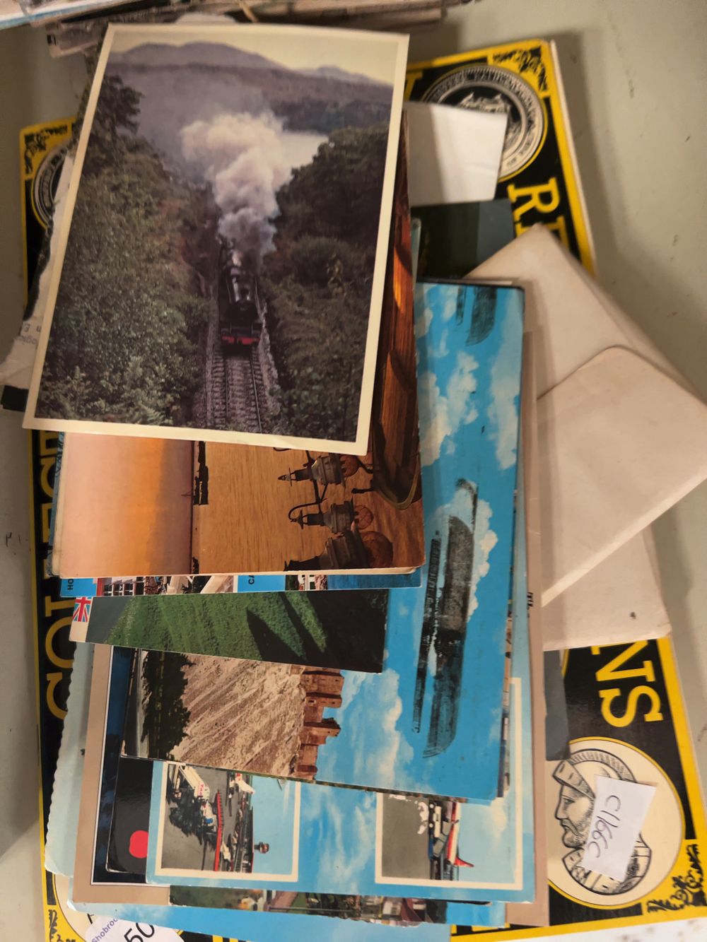 Lot 450: A Collection of Approximately 50-70 Topographical and Transport Postcards and a Railway Reproductions Collectors Locomotives Folder