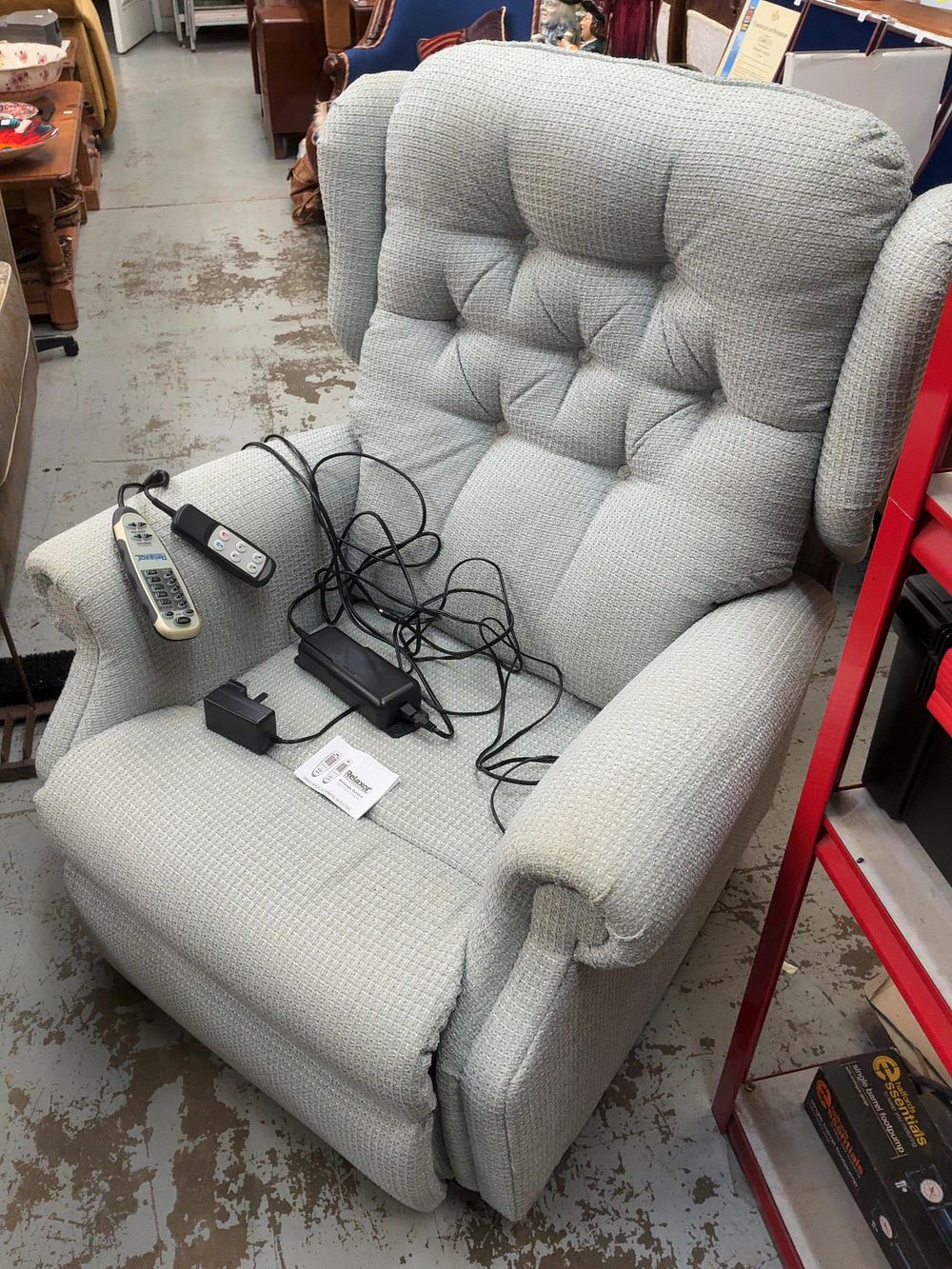 Lot 466: An Electric Riser Recliner Armchair with Relaxor Ultra Massage and Heat System