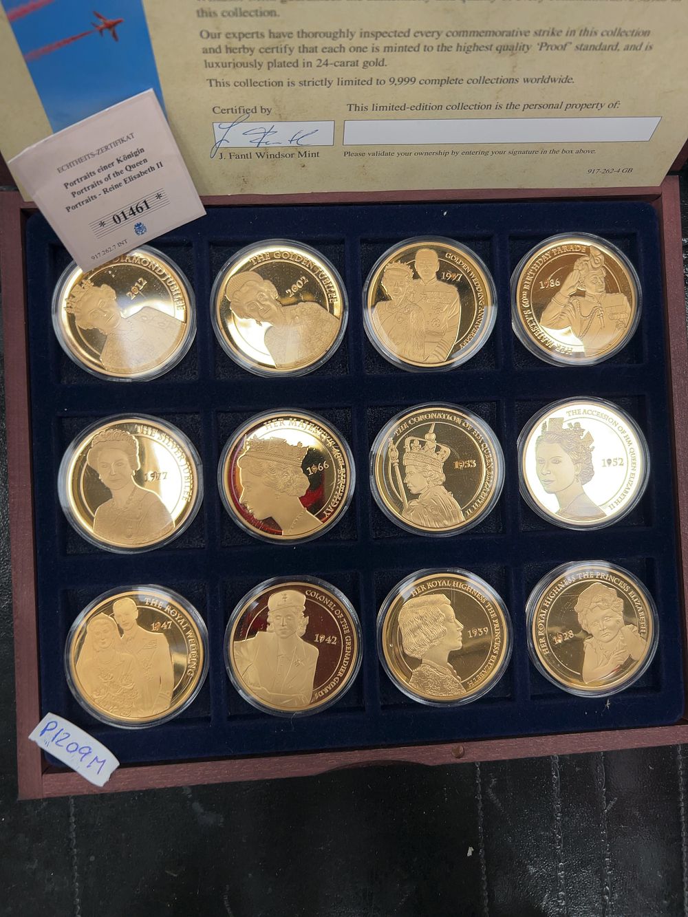 Lot 472: A Set of Twelve Windsor Mint Portraits of a Queen Gold-Plated Copper Medals with Presentation Case