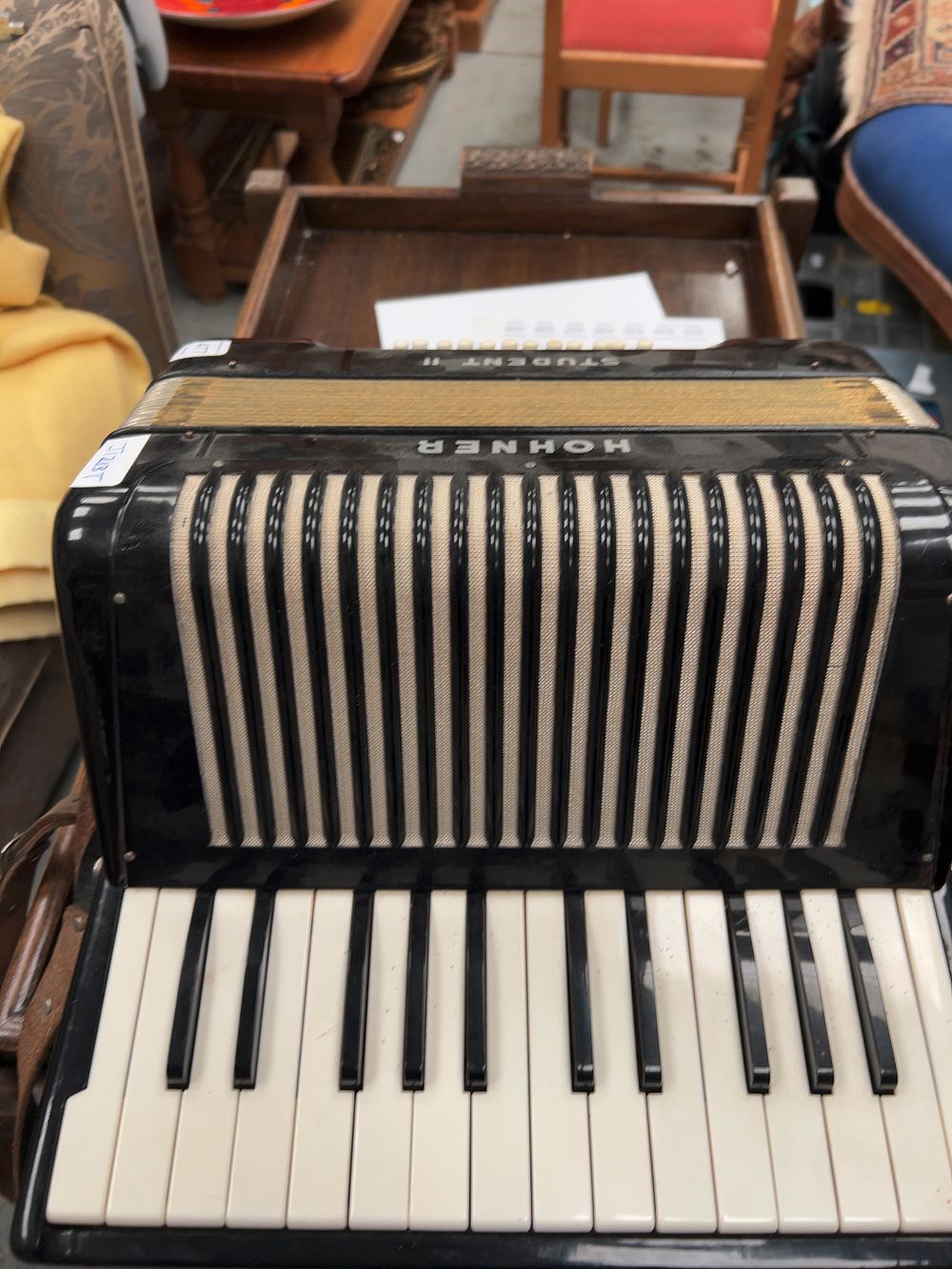 Lot 477: A Hohner Student II Piano Accordion with Twelve Bass Buttons